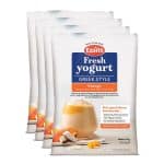 Komkom yoghurtpoeder voor zelfmaken van Griekse stijl yoghurt met mango smaak.