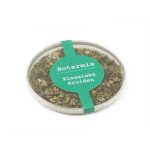 Gedroogde kruidenmix in plastic container voor koken en bakken.